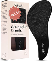 Kitsch Detangler Brush closeup with flexible bristles for gentle detangling.