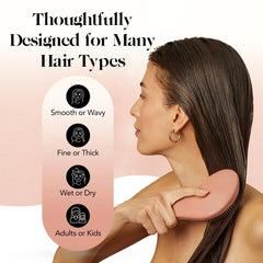 Kitsch Detangler Brush provides scalp massage during brushing.
