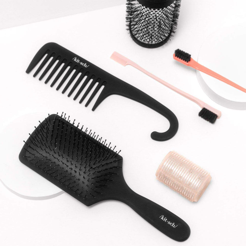 Kitsch detangler close-up highlighting ergonomic curved handle and grip