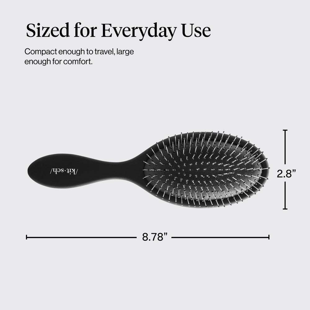 Kitsch Flexi Black bristles provide scalp massage as you brush.