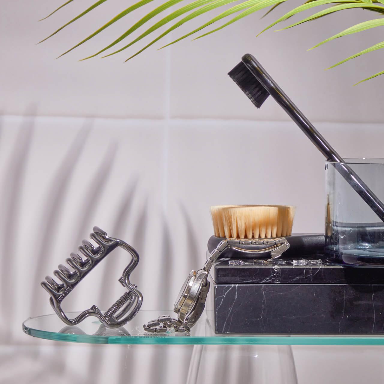 Kitsch hematite finish clip elevates casual and formal looks.