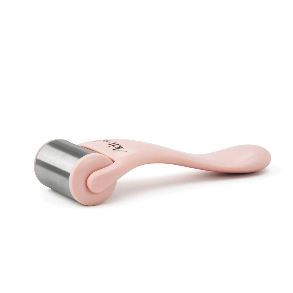 Kitsch Ice Roller on cheeks delivers cool, soothing relief.
