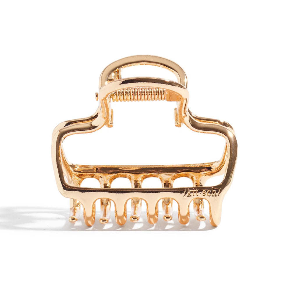 Kitsch metal claw clip delivers durable hold for daily wear.