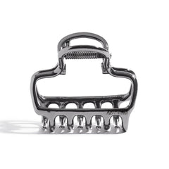 Kitsch metal claw clip offers secure hold for thick or thin hair all day.