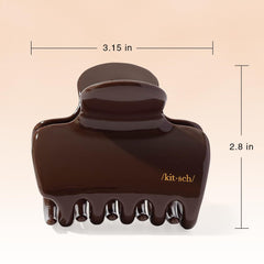 Kitsch pinza de pelo chocolate, textura reciclada y sostenible, accesorio ecoamigable.