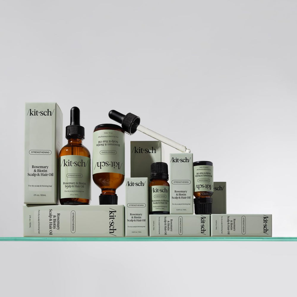 Kitsch rosemary oil used in a pre-wash routine at bathroom sink.