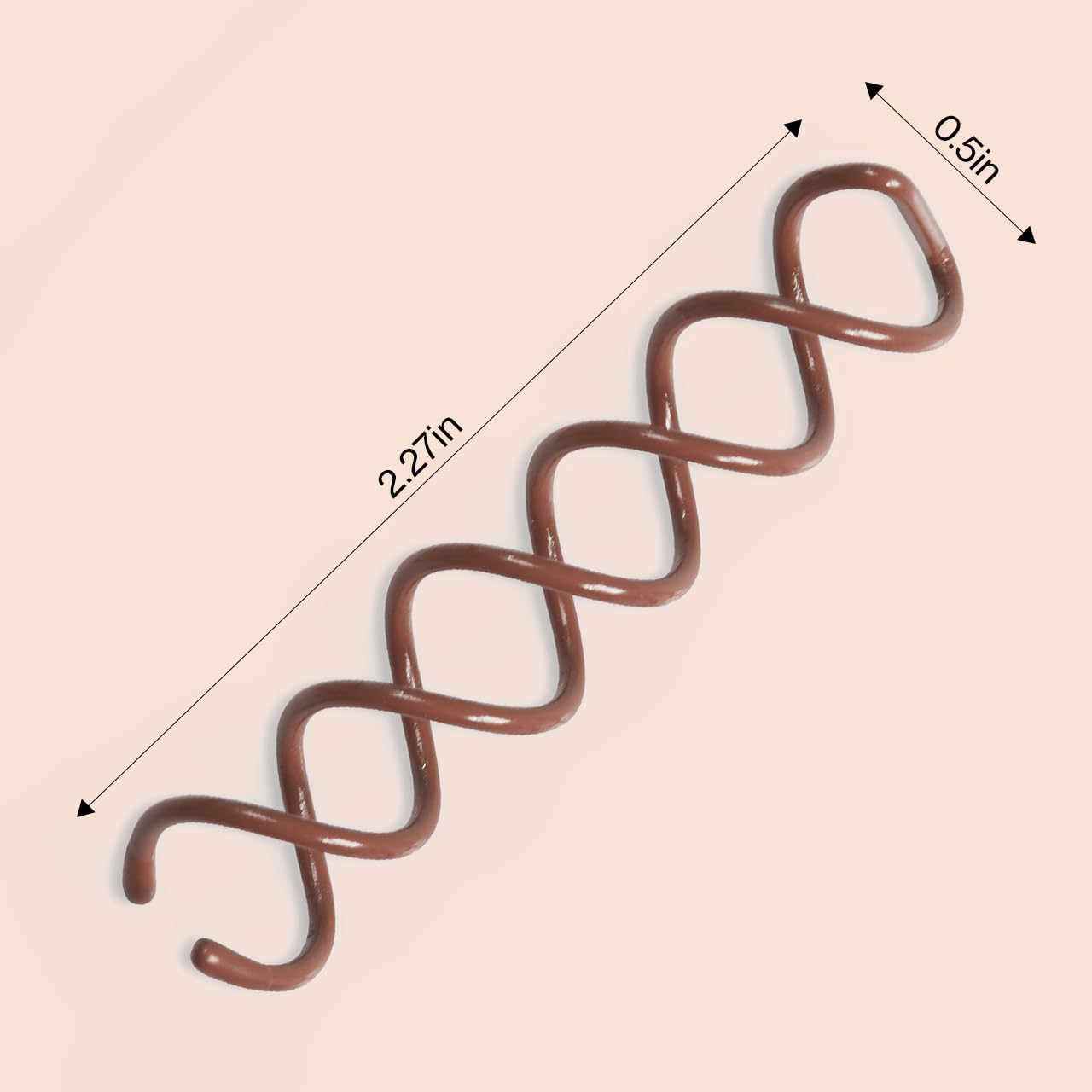 Close-up of Kitsch spiral hair pins gripping hair gently for comfortable buns.