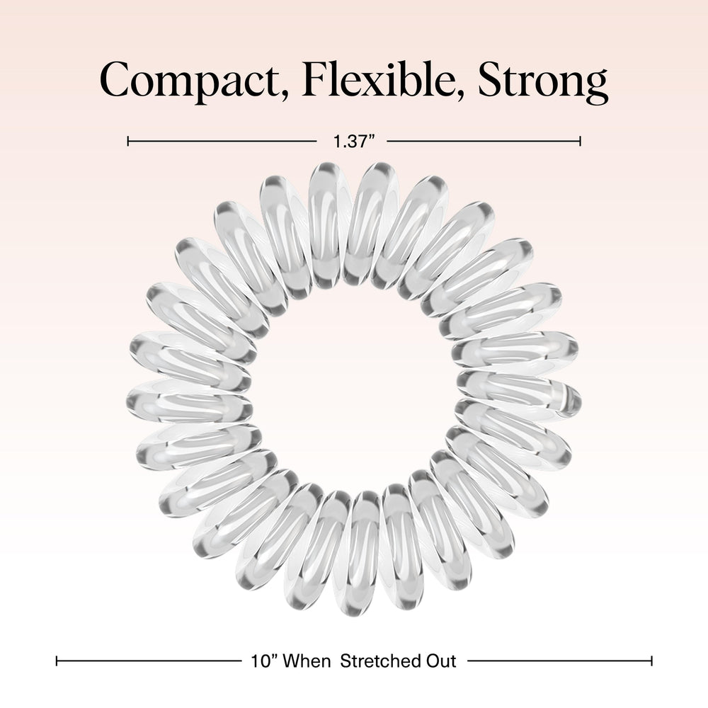 Kitsch spiral hair ties double as stylish wrist accessories in colors.