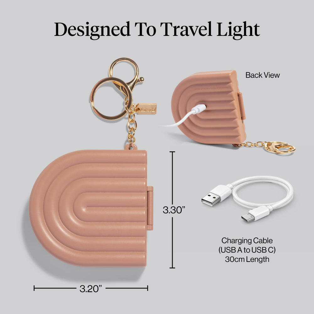 Kitsch USB-rechargeable mirror powers up for long travel days.