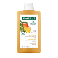 Klorane champú manteca de mango en envase, ideal para hidratación diaria.