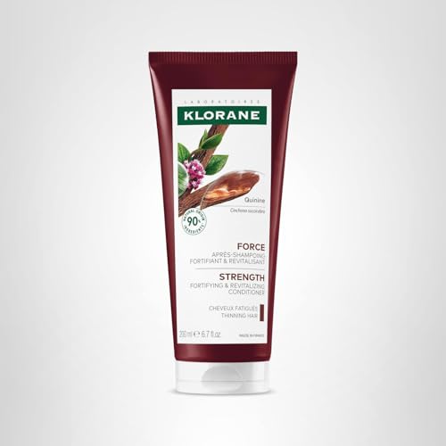 Klorane conditioner texture on hand shows creamy, weightless conditioning.