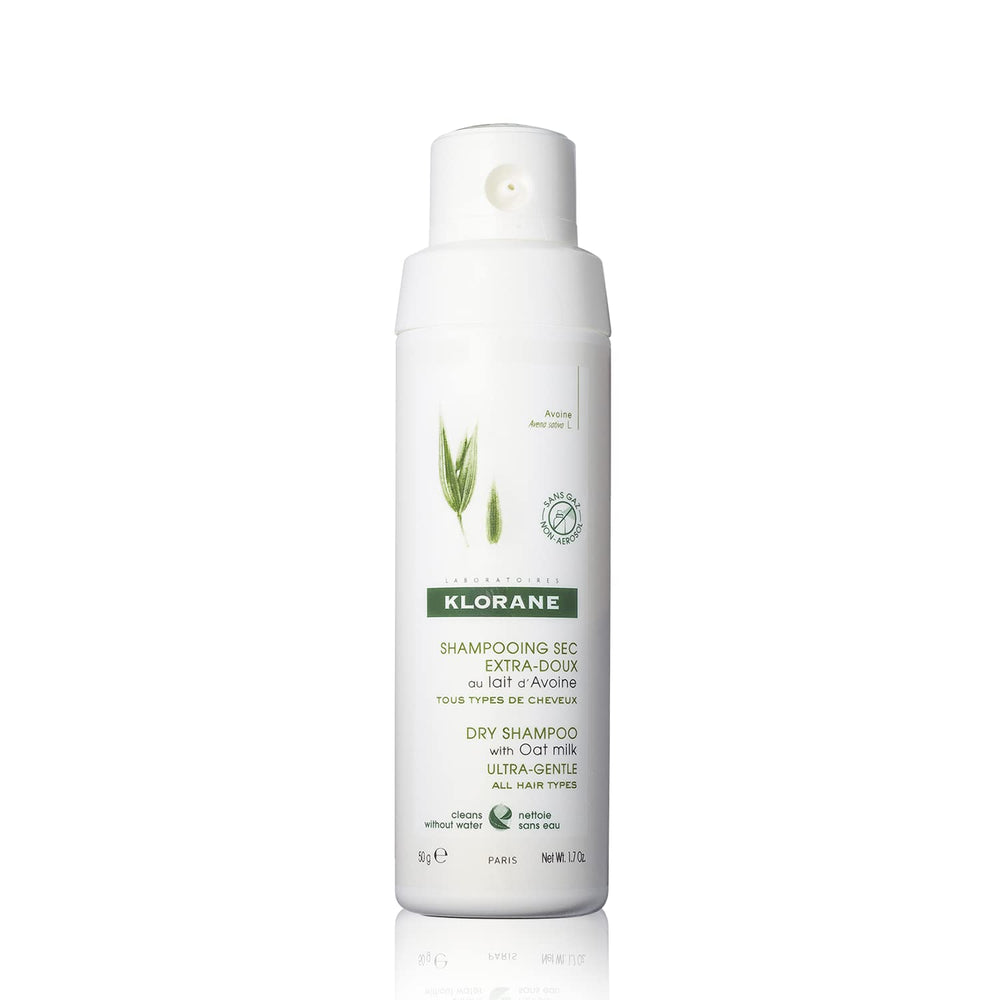 Klorane Dry Shampoo Oat Milk bottle dispensing powder for quick refresh between washes.