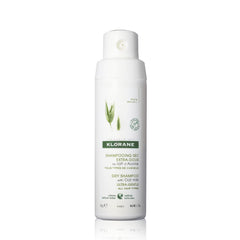 Klorane Dry Shampoo Oat Milk bottle dispensing powder for quick refresh between washes.
