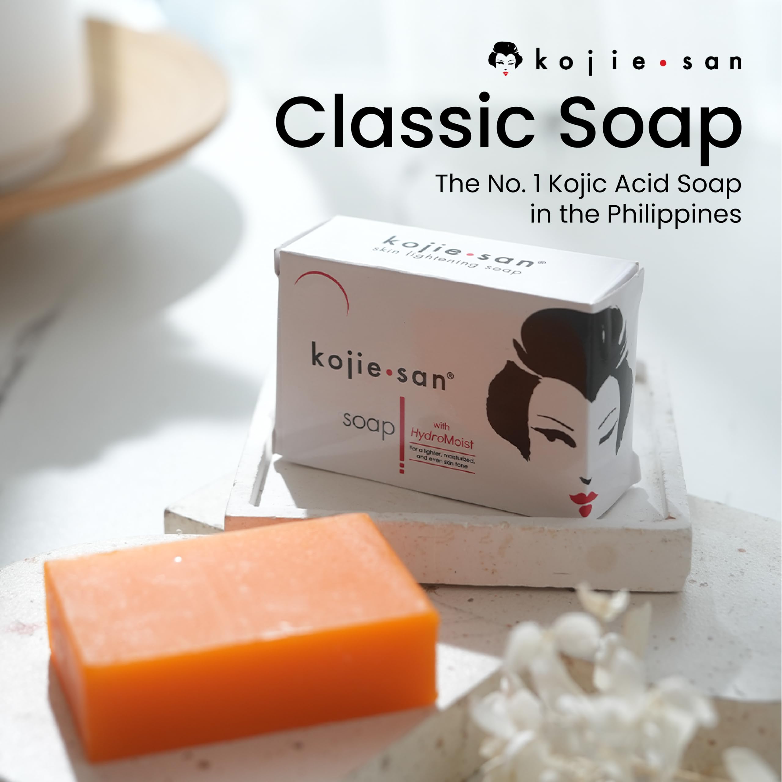 Kojie San coconut oil moisturizing soap with visible lather.