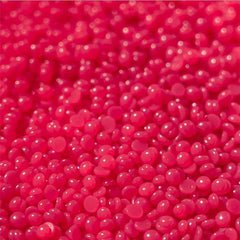 KoluaWax beads melting in warmer for smooth, consistent hair removal sessions.