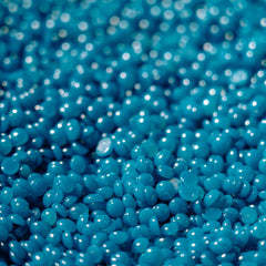KoluaWax coarse-hair formula beads close-up, ideal for stubborn facial and body hair