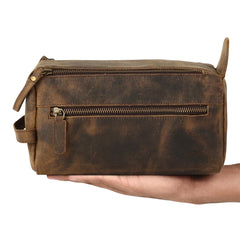 KomalC toiletry bag with water-resistant lining protects grooming essentials.