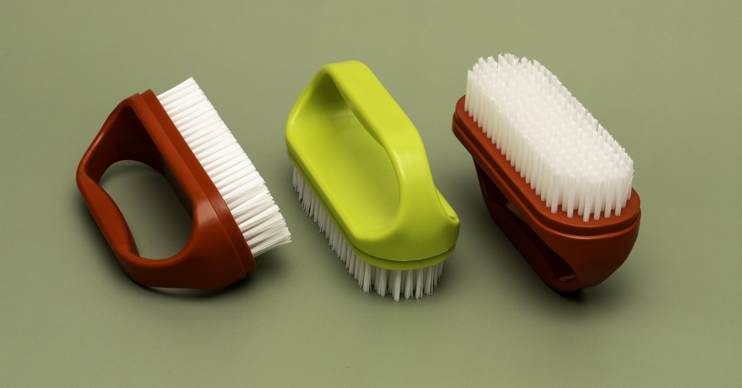 Konex nail scrub brush features stiff synthetic bristles for thorough cleaning.