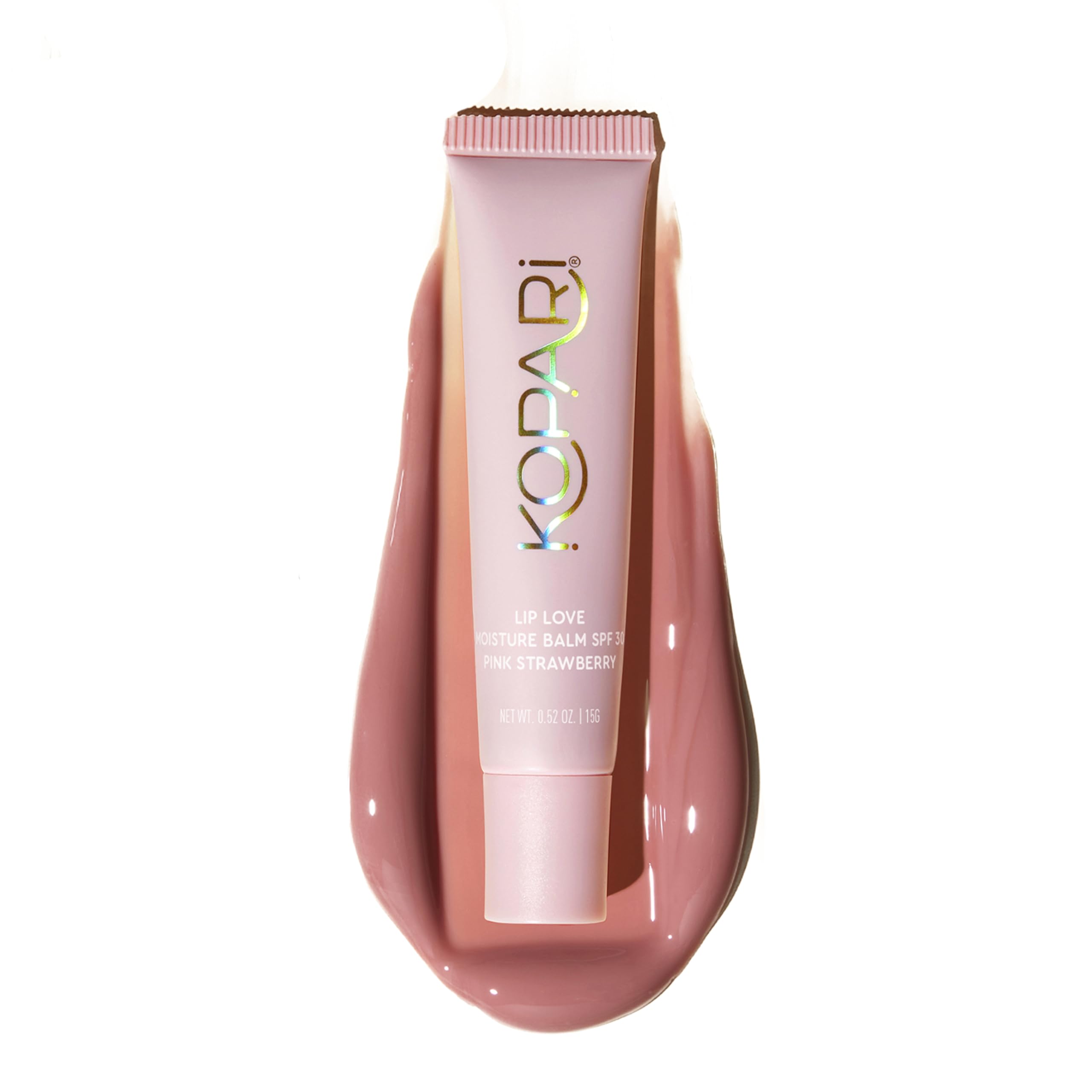 Kopari Lip Love con color rosado fresa y SPF 30 hidrata los labios.