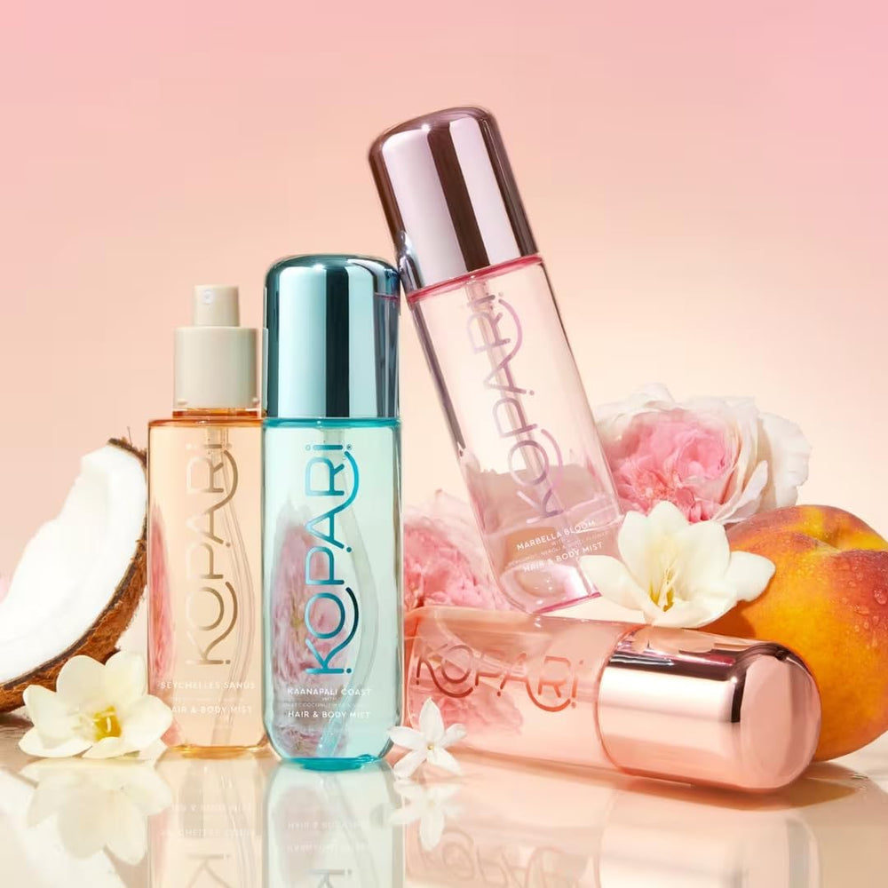 Kopari mist being applied to skin and hair for refreshing feel.