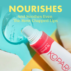 Kopari lip glossy bottle close-up highlights organic coconut oil ingredients.