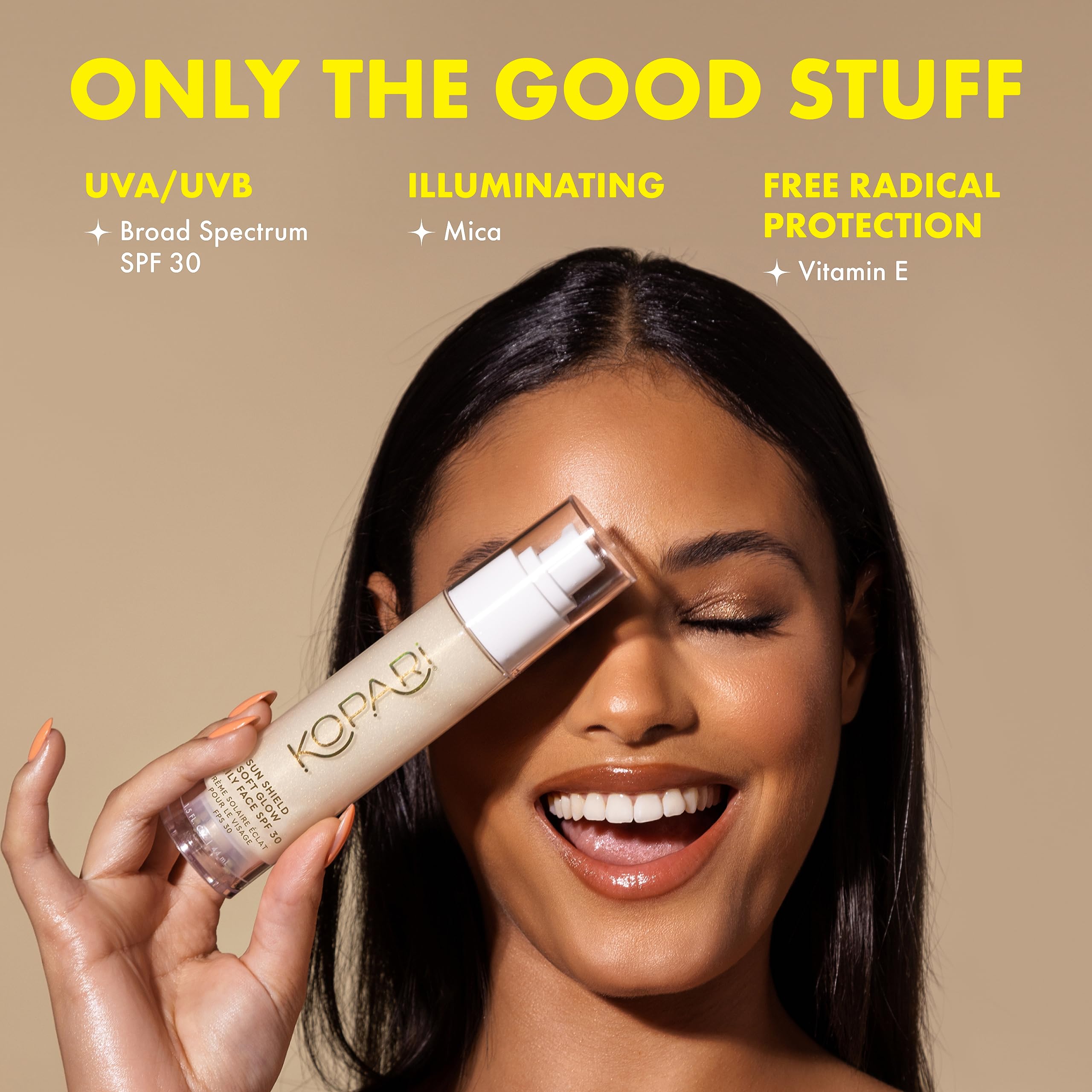 Kopari Sun Shield Soft Glow applied on face with quick absorption.