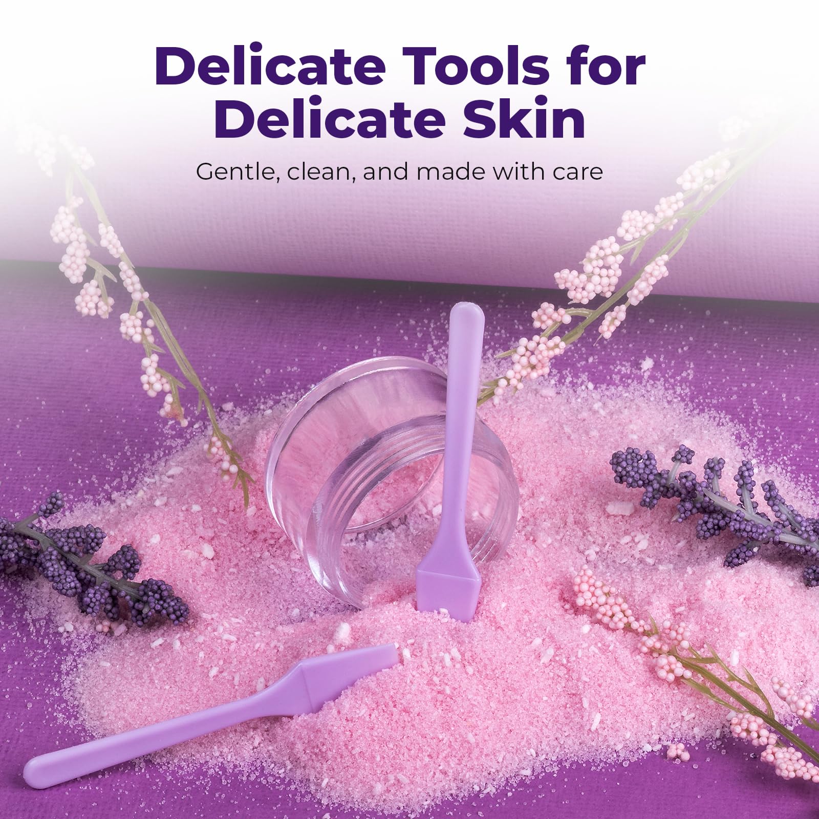 Rigid plastic Kopperko spatula for reliable cosmetic mixing.
