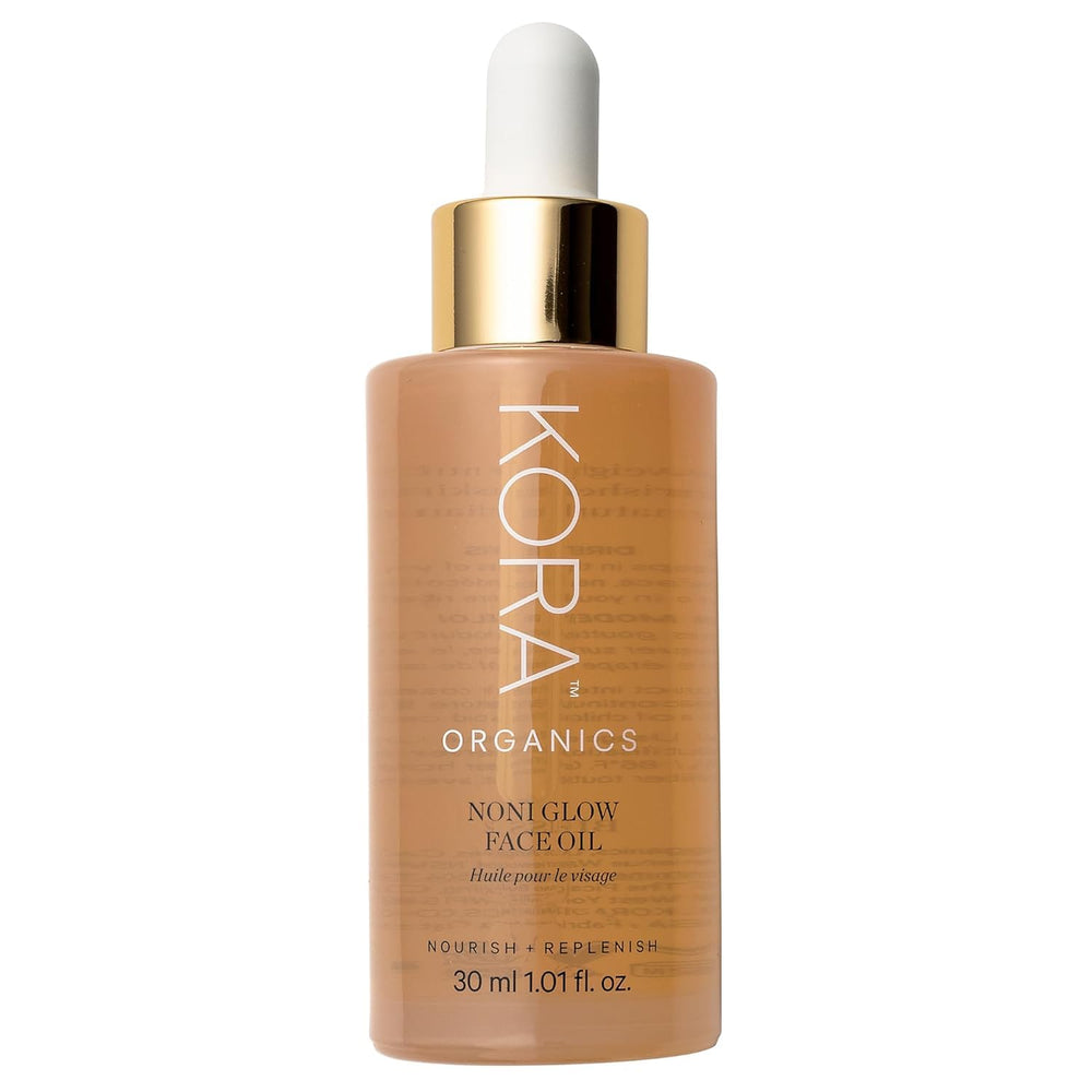 KORA Organics Noni Glow bottle close-up highlights radiant hydration.