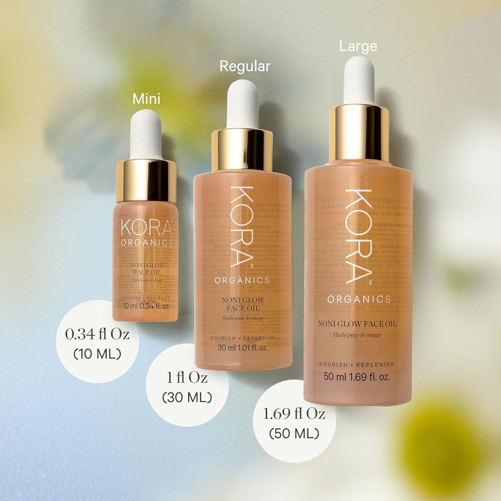 KORA Organics Noni Glow oil texture swirl on skin for absorption.