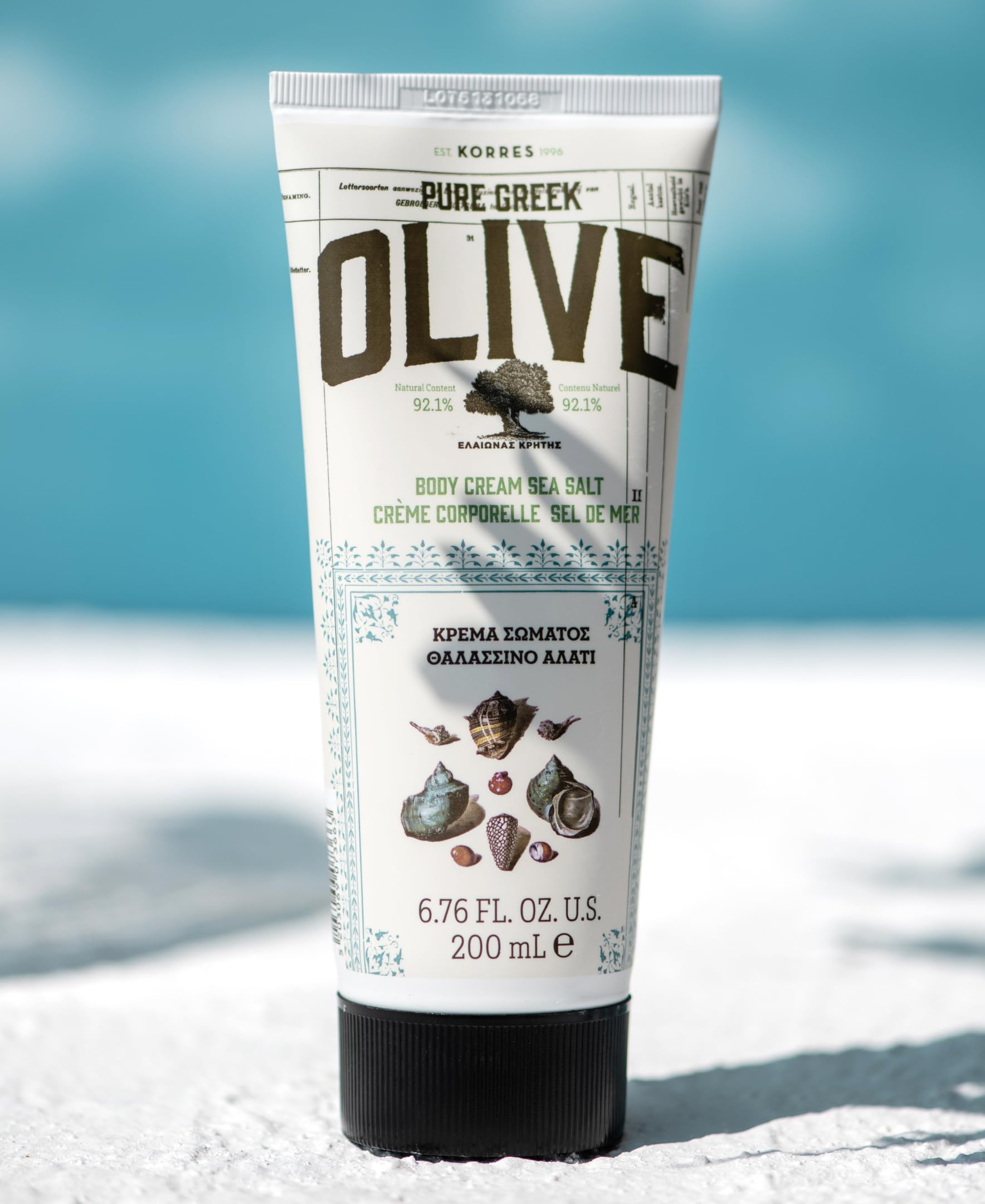 KORRES Olive Body Lotion featuring aloe and olive oil for nourished skin.