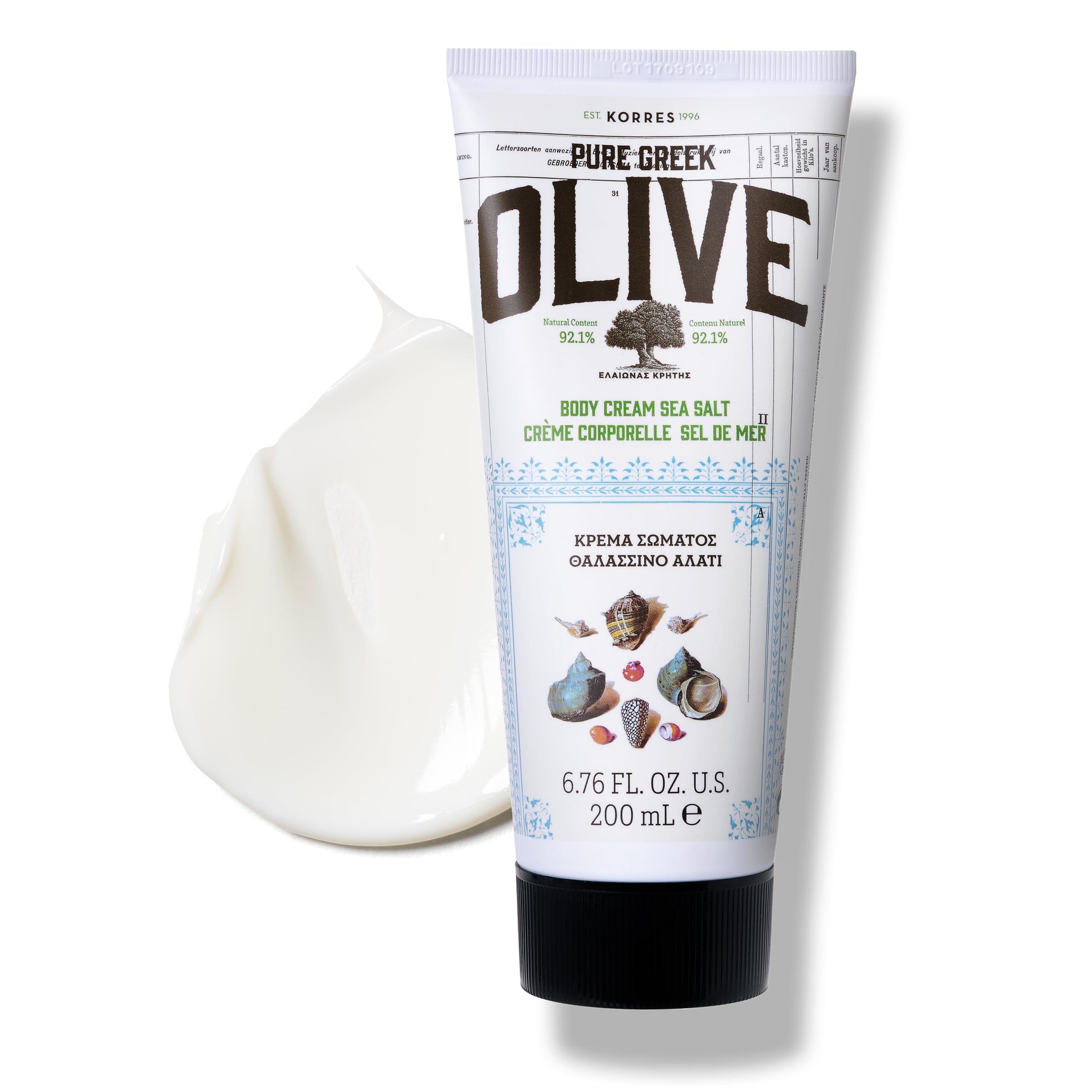 KORRES Olive Body Lotion bottle close-up showing fast-absorbing hydration for dry skin.