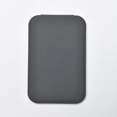 korutomi pocket mirror closed gray with PU cover, ideal for on-the-go touch-ups.