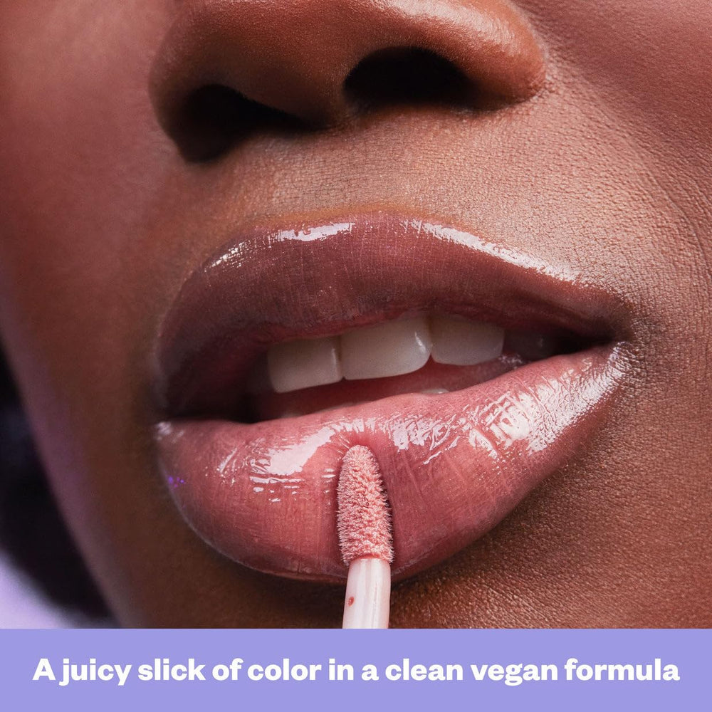 Kosas Wet Lip Oil Gloss peptides and botanicals nourish lips.