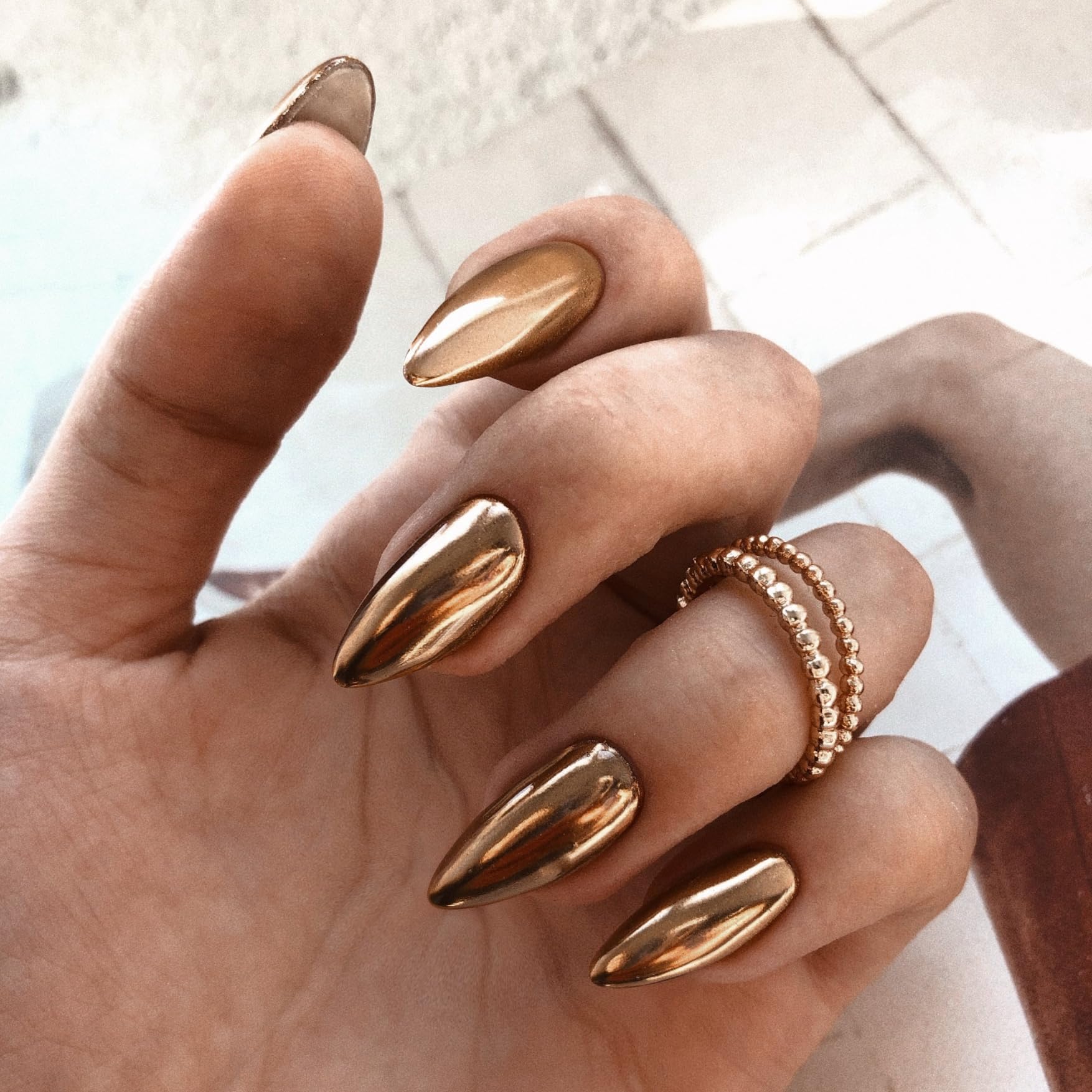 KQueenest metallic brown acrylic nails in medium stiletto for bold daily glam