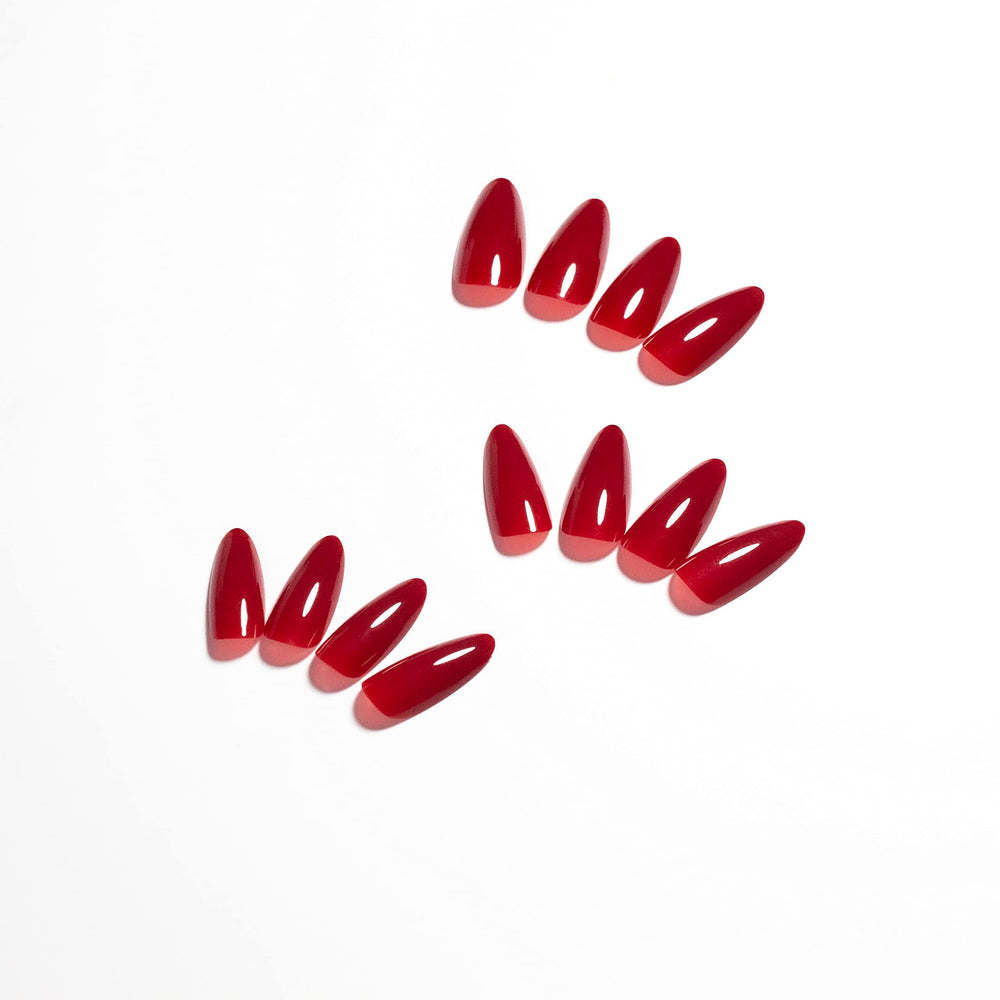 KQueenest red almond press-ons close-up showing smooth surface for chip-free wear