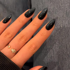 KQueenest Uñas negras con brillo, diseño Cat Eye para looks festivos.