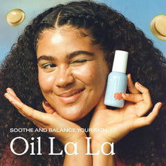 KraveBeauty Oil La La dropper demonstrates precise, gentle dosing for balanced skin.
