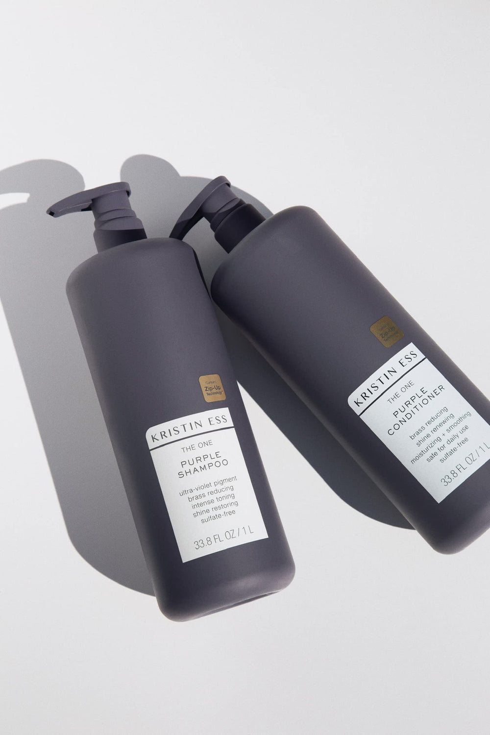 One-liter bottle of Kristin Ess Detox Shampoo for frequent use and shared bathrooms.