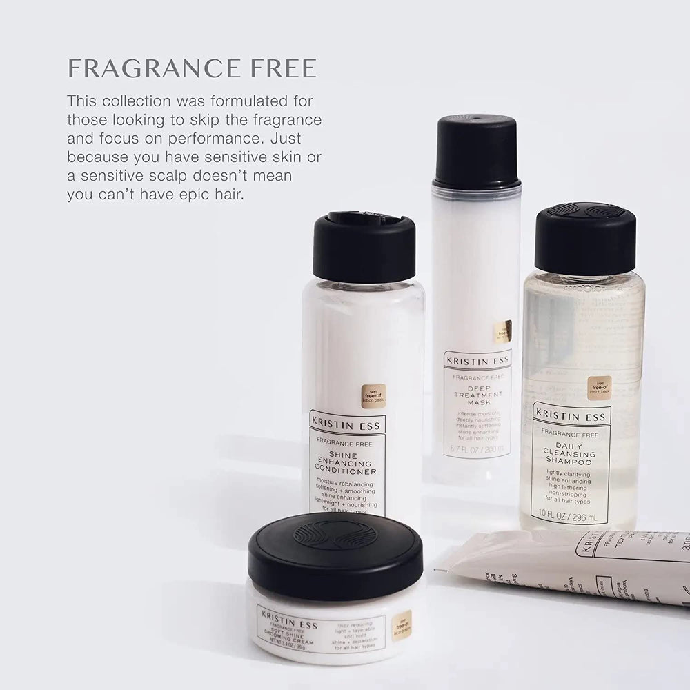 Close-up of Kristin Ess Fragrance Free Shine Enhancing Conditioner label emphasizing fragrance-free benefits