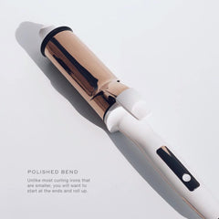 Kristin Ess Hair 2 Inch Titanium Curling Iron's heat-resistant tip reduces creasing during styling.