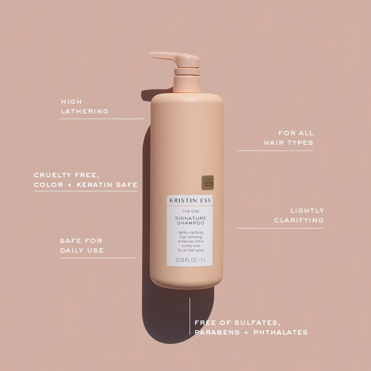 Creamy lather forms during use with Kristin Ess Hair One Signature Shampoo.