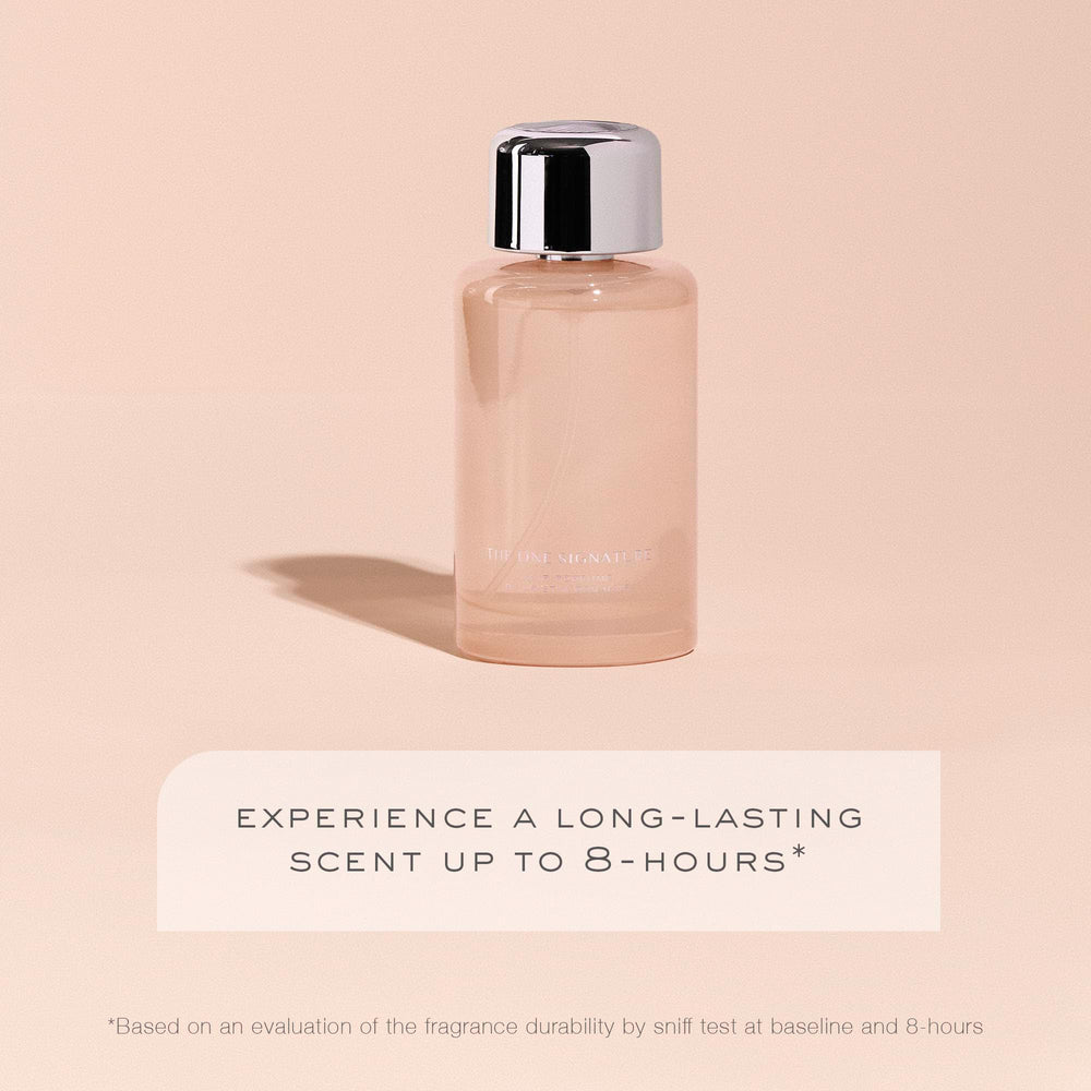 Kristin Ess One Signature Hair Perfume on dresser with soft lighting for evening prep.