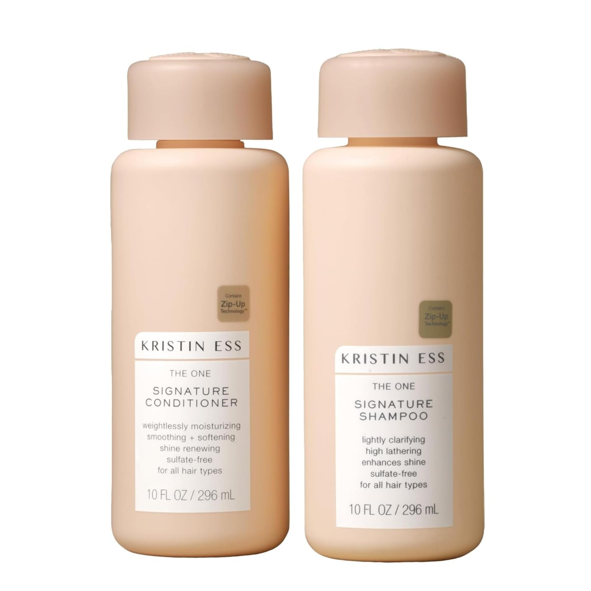 Kristin Ess One Signature Shampoo bottle close-up, showcasing moisture and shine.