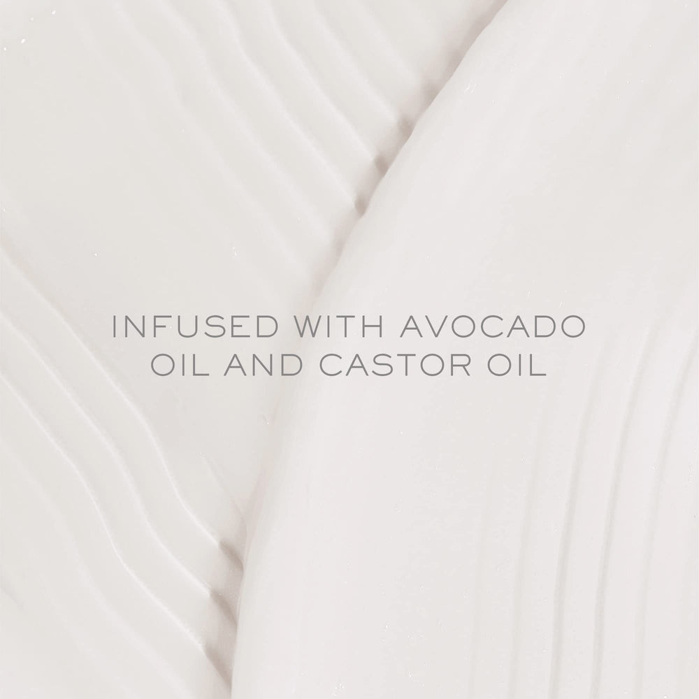 Kristin Ess One Signature Shampoo label close-up highlighting avocado oil benefits.