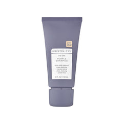 Kristin Ess The One Purple Shampoo mini botella: neutraliza tonos amarillos y bronceados.