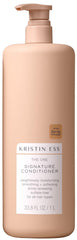 Kristin Ess The One Signature Conditioner bottle closeup for smooth, hydrated hair.