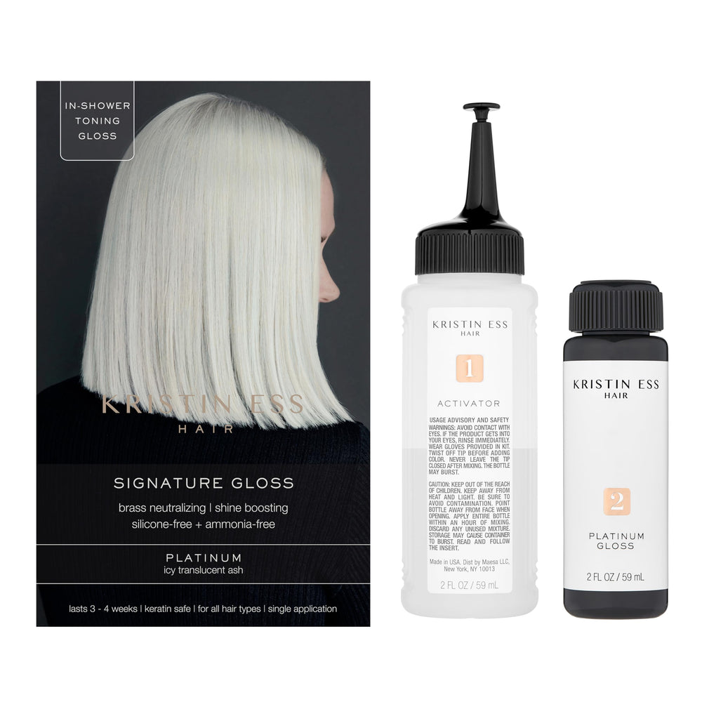 Close-up of Kristin Ess The One Signature Hair Gloss Platinum packaging