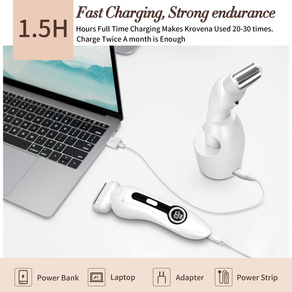 Krovena electric razor resting on USB charging stand for convenient power and storage.