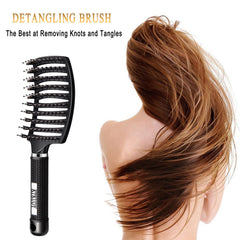 KTKUDY curved detangler provides comfortable grip for pain-free knot removal