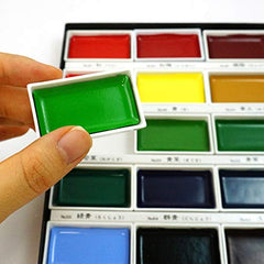 Kuretake GANSAI TAMBI includes a palette and color chart for quick color reference
